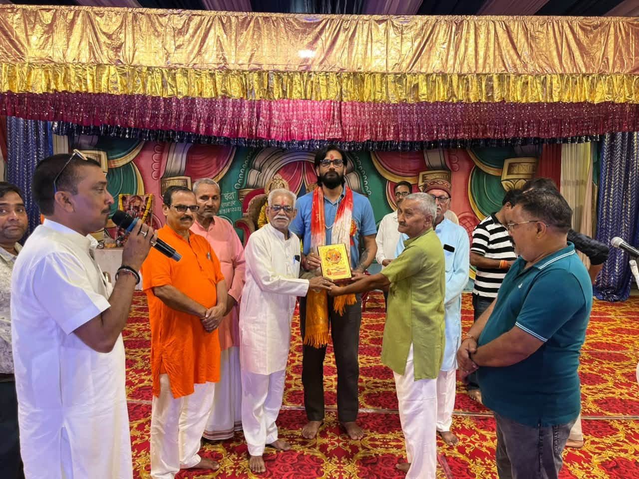 Felicitated at a community programme